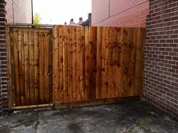 Solid wooden gate and fence