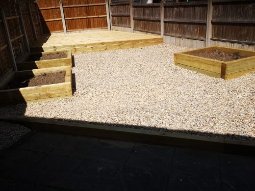 Click Here To Enlarge This Photo Of Decking, gravel and planters