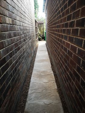 Click Here To Enlarge This Photo Of Paved ally way 