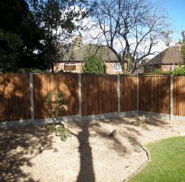 Graveled garden with wooden fence: Click Here To View Larger Image